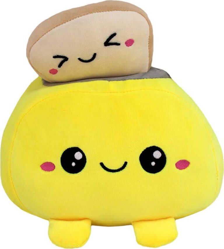 Gelbes Plüschtier in Form eines Toasters mit Toast aus Stoff. Gelbes Plüschtier in Form eines Toasters mit Toast aus Stoff.