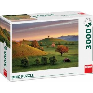 Puzzle-Schachtel mit Landschaftsmotiv von grünen Hügeln bei Sonnenuntergang.